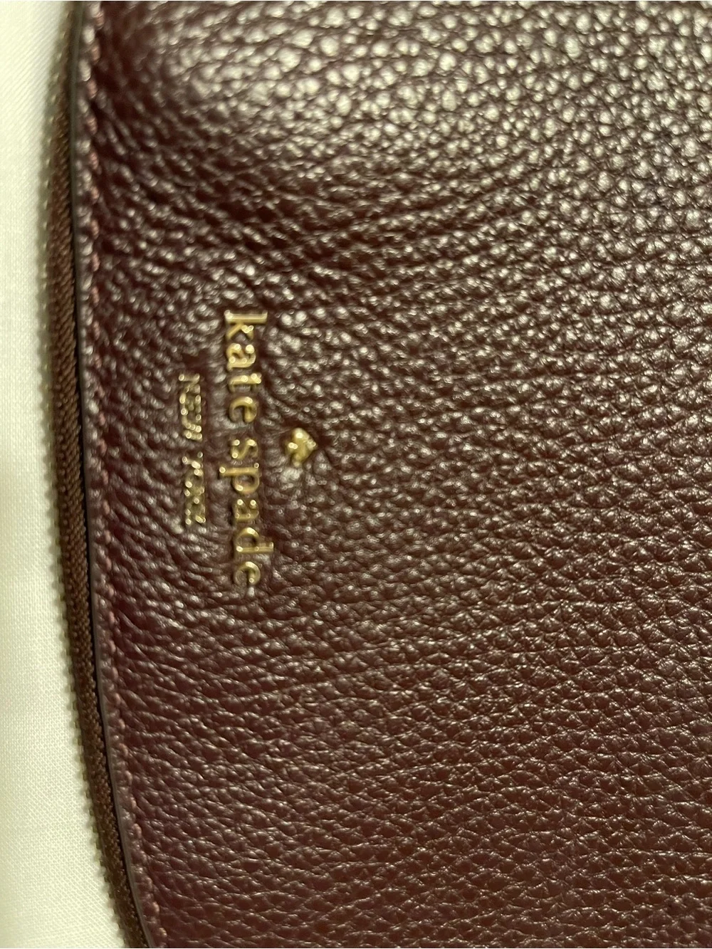 kate spade Pebble Leather Shoulder Bag with matching wallet in Deep Burgundy.